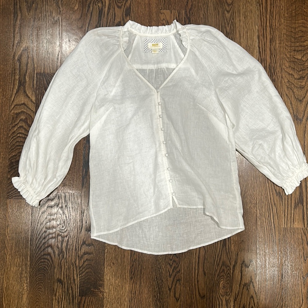 White linen shirt with covered buttons, ruffled collar and puffed sleeves